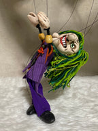 Handcrafted Joker DC Comics puppet with iconic grin and Batman villain costume - front view