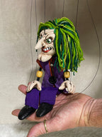 Clown Prince of Crime Joker marionette with sinister expression and professional stringing