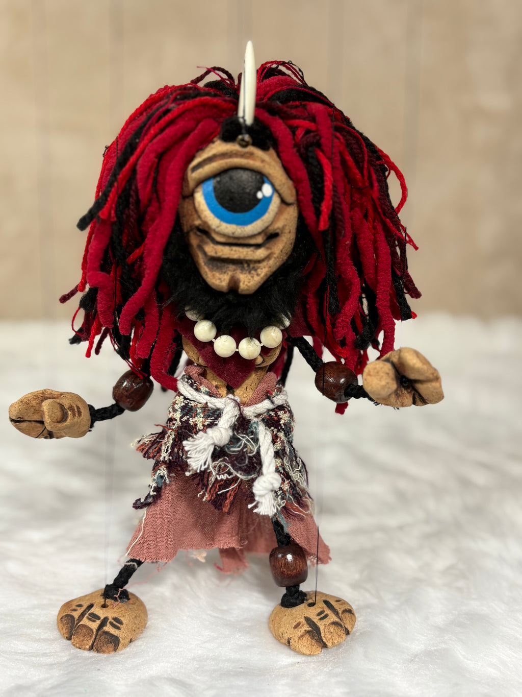 Red Cyclops marionette puppet handcrafted by The Squeaking Tribe — one-eyed Greek mythology character, 25cm